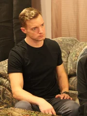 Adam Berry during a nighttime investigation at the Web family home, as seen on Travel Channel's Kindred Spirits.