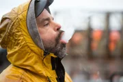 Bradley taking a puff on the deck of the Northwestern.