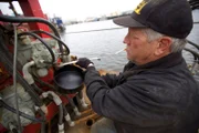 Steve Pomrenke using a wrench.