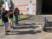 The staff of Orange County Choppers take photos of the Hyrdromat bike just before Paul Sr. takes it on a test drive.