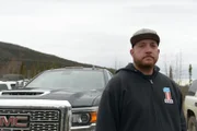 Rick Ness posing by truck