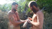 Jamie and Brandon holding log