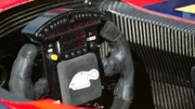 Drivers view of a racing car steering wheel