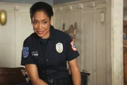 Tommy Vega (Gina Torres)