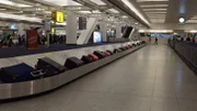 Das Gepäck dreht sich auf dem Karussell der Gepäckausgabe am JFK International Airport. (National Geographic)