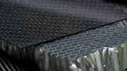 Black carbon fiber composite product material background