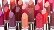 Multicolored color lipsticks isolated on white