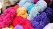 Many skeins of colorful wool felting