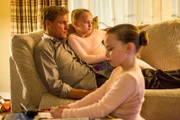 SCENE 3.42/Interior Hart Home - Living Room (1995) - Maggie and Marty talk to Audrey about something she drew./ Photo: Skip Bolen/HBO  HBO's "True Detective" Season 1  Director: Cary Fukunaga  Matthew McConaughey: Rustin Cohle Woody Harrelson: Martin Hart Michelle Monaghan: Maggie Hart Madison Wolfe: Audrey Hart Meghan Wolfe: Macie Hart