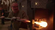 J pressing hot cannister in press. TONY FETTERS out of focus in background