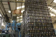 Bottling and Canning Facility, County Antrim, UK: Empty Guinness cans are loaded into the filling lines. First they are given an air wash.