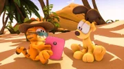 Garfield verliert sich in Urlaubsphantasien.
