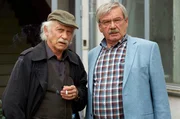 Edwin Bremer (Tilo Prückner, l.) und Günter Hoffmann (Wolfgang Winkler, r.) müssen den Mord an einem Banker aufklären.