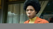 Fred Mitchell smoking a cigarette.