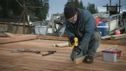 PORT PROTECTION, ALASKA- Sam Carlson works on the community work float. (Photo Credit: National Geogrpahic Channels/Jason Hubbell)