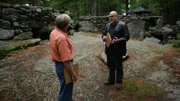 Location president & owner Dennis Stone (left) talks to Dave Schrader (right) about his paranormal experiences for the investigation at Mystery Hill in Salem, NH as seen on Travel Channel's The Holzer Files.