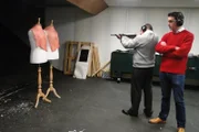 The Royal Armouries, Leeds, England - Presenter Joe Crowley at a firing range with ballistic expert Philip Boyce.