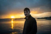 Dan O'Neill vor einem Sonnenuntergang