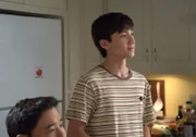 Randall Park (Louis Huang), Forrest Wheeler (Emery Huang).