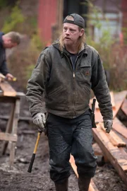 PORT PROTECTION, ALASKA- David Squibb helps Hans and Timbi Porter build their greenhouse in Port Protection. (Photo Credit: National Geographic Channels/Robert Jolley)