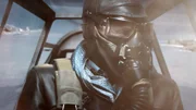 Pilot im Cockpit während eines Luftkampfes.