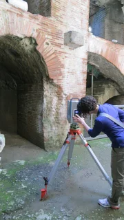 Pozzuoli, Campania, Italy - Rachel Opitz scanning the arches of the Pozzuoli ampitheatre using the Z&F scanner.