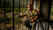 Gene Cheeseman sat inside the dredge wheelhouse.