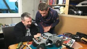 L-R: Daniel Siegl and Lukas Klapfer are working on a Toyota 4Runner.