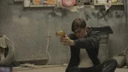 Recreation of mafia goon pointing gun