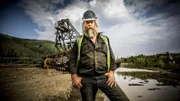 Tony Beets standing in front of the dredge.