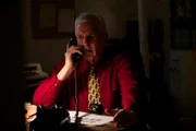 Hostage negotiator on phone.