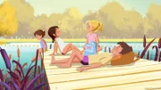 Die Mädchen genießen die Sonne am Badesee.