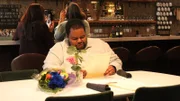 Tyray looking at a menu