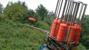 Orange clay pigeons fired from a trap