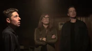Paranormal investigators Amy Bruni (m.) and Adam Berry (r.) with owner, Mike Beck (l.), walking through the basement of the Toboggan Inn, where he hears disembodied voices and sees shadow figures.