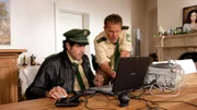 L-R: Polizeiobermeister Johannes Staller (Helmfried von Lüttichau) and Polizeiobermeister Franz Hubert (Christian Tramitz)