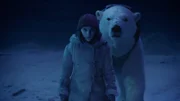 L-R: Lyra Belacqua (Dafne Keen) and Iorek Byrnison (Joe Tandberg voice)