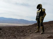 DRAMATIZATION: The spaceman comes to the surface of earth to look for evidence of past civilizations. More than 80% of the world would be unbearable to most animal life.