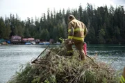 Sam Carlson prepares to start a controlled burn and a fire drill for him and the local firemen.