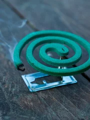 Mosquito coil on the wood