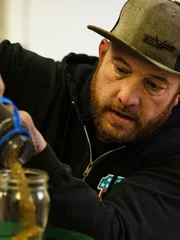 Rick Ness pouring gold.