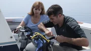 Rob Nelson and Valerie Van Heest prepare for their dive to a shipwreck that could be the lost cargo vessel, the Thomas Hume.