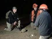 Rob talks to two members of the USGS team -- Lead scientist Luther Strayer (middle) and Geologist Rufus Catchings (right) -- about the detonations they are about to set off in the hills near the Hayward Fault. Rob talks to two members of the USGS team -- Lead scientist Luther Strayer (middle) and Geologist Rufus Catchings (right) -- about the detonations they are about to set off in the hills near the Hayward Fault.