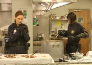 BONES: Brennan (Emily Deschanel, L) and Cam (Tamara Taylor, R) investigate remains that were tossed in a meat grinder and mixed into cans of stew served in a school cafeteria in the "The Mystery in the Meat" episode of BONES airing Friday, Nov. 22 (8:00-9:00 PM ET/PT) on FOX.