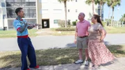 From left to right: Host David Bromstad, Steve Klayman, and Jennifer Klayman meet outside of House 3, Eegret Landing, as seen on My Lottery Dream Home, Season 17.