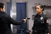 Tommy Vega (Gina Torres).