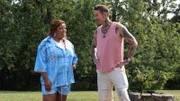 Sharon Godbold (left) explores the backyard of House 1, Mistwood Trail, with Host David Bromstad (right), as seen on My Lottery Dream Home, Season 17.