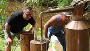 Tim Smith and Howard Thompson putting paste on the still
