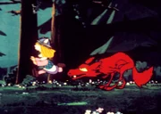Wickie rennt um sein Leben: er wird von einem Wolf verfolgt.