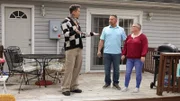 David Bromstad (l.) with the new house owners.